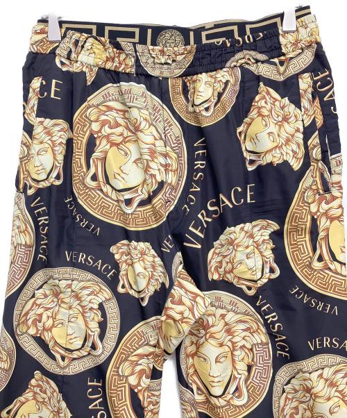 VERSACE（ヴェルサーチェ）VERSACE (ヴェルサーチェ) 柄パンツ ブラック×イエロー サイズ:Mの古着・服飾アイテム