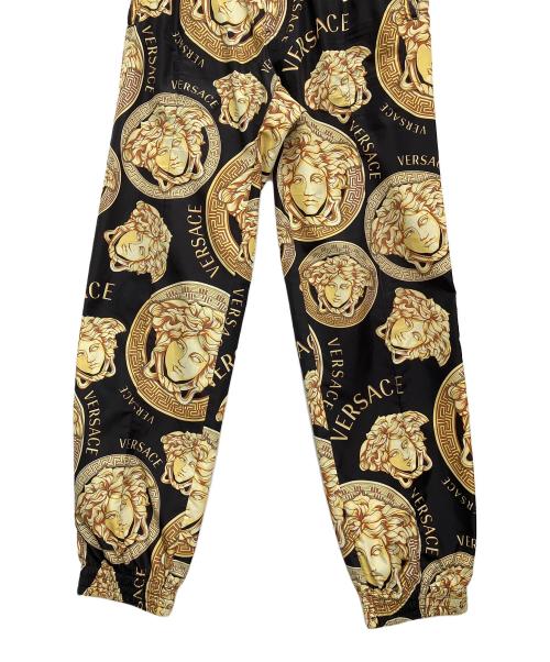 VERSACE（ヴェルサーチェ）VERSACE (ヴェルサーチェ) 柄パンツ ブラック×イエロー サイズ:Mの古着・服飾アイテム