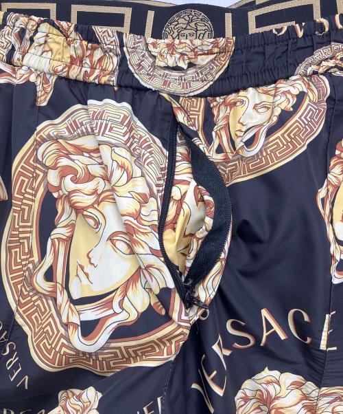 VERSACE（ヴェルサーチェ）VERSACE (ヴェルサーチェ) 柄パンツ ブラック×イエロー サイズ:Mの古着・服飾アイテム