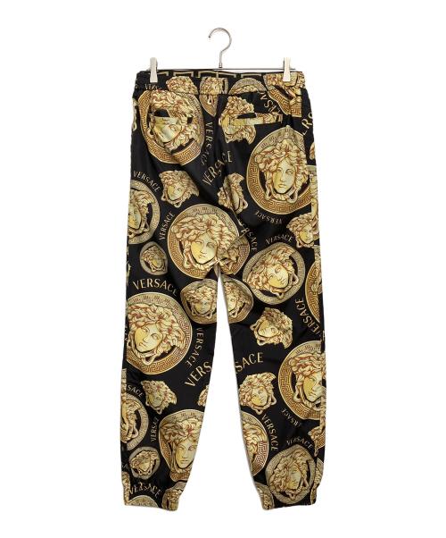 VERSACE（ヴェルサーチェ）VERSACE (ヴェルサーチェ) 柄パンツ ブラック×イエロー サイズ:Mの古着・服飾アイテム