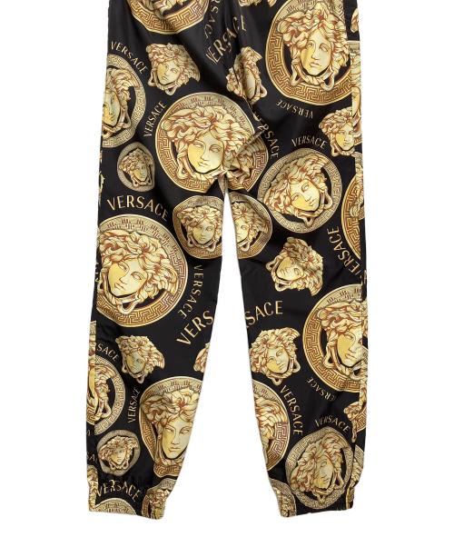 VERSACE（ヴェルサーチェ）VERSACE (ヴェルサーチェ) 柄パンツ ブラック×イエロー サイズ:Mの古着・服飾アイテム