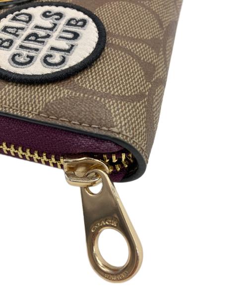 COACH（コーチ）COACH (コーチ) DISNEY (ディズニー) ロング ジップ アラウンド ウォレット ブラウン×パープルの古着・服飾アイテム