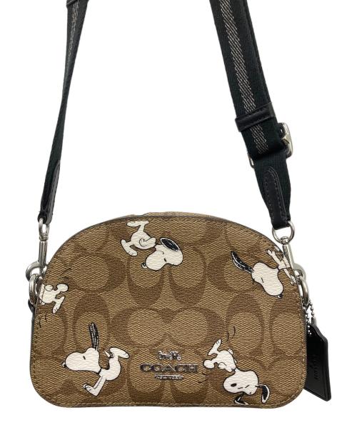 COACH（コーチ）COACH (コーチ) ショルダーポーチ シグネチャー スヌーピー ブラウンの古着・服飾アイテム