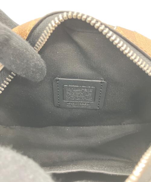 COACH（コーチ）COACH (コーチ) ショルダーポーチ シグネチャー スヌーピー ブラウンの古着・服飾アイテム