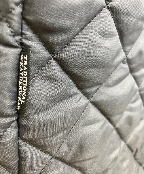 Traditional Weatherwear（トラディショナルウェザーウェア）Traditional Weatherwear (トラディショナルウェザーウェア) キルティングコート ARKLEY LONG(アークリーロング) ネイビー サイズ:UK32の古着・服飾アイテム