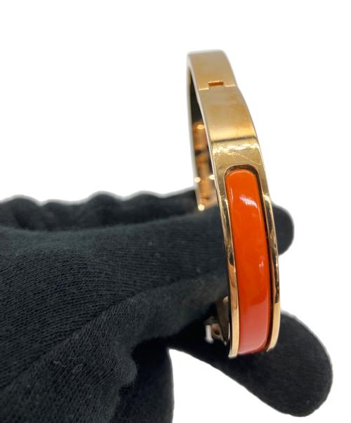 HERMES（エルメス）HERMES (エルメス) バングル　ミニクリックシェーヌダンクル オレンジ×ゴールドの古着・服飾アイテム