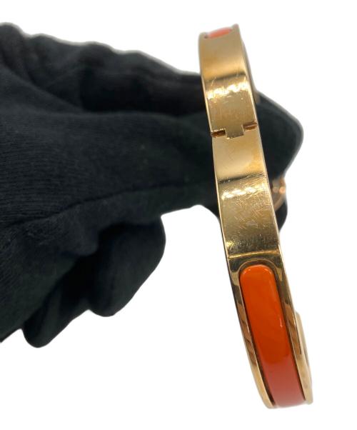 HERMES（エルメス）HERMES (エルメス) バングル　ミニクリックシェーヌダンクル オレンジ×ゴールドの古着・服飾アイテム