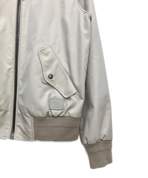 COACH（コーチ）COACH (コーチ) ジップアップジャケット ベージュ サイズ:Mの古着・服飾アイテム