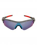 OAKLEYオークリー）の古着「RADARLOCK サングラス」｜シルバー×オレンジ