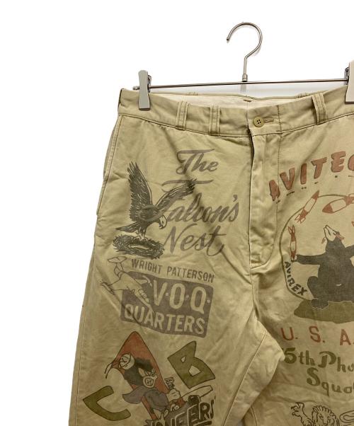 AVIREX（アヴィレックス）AVIREX (アヴィレックス) 60’s ARMY CHINO PANTS ”ARCHIVE GRAPHIC カーキ サイズ:Lの古着・服飾アイテム