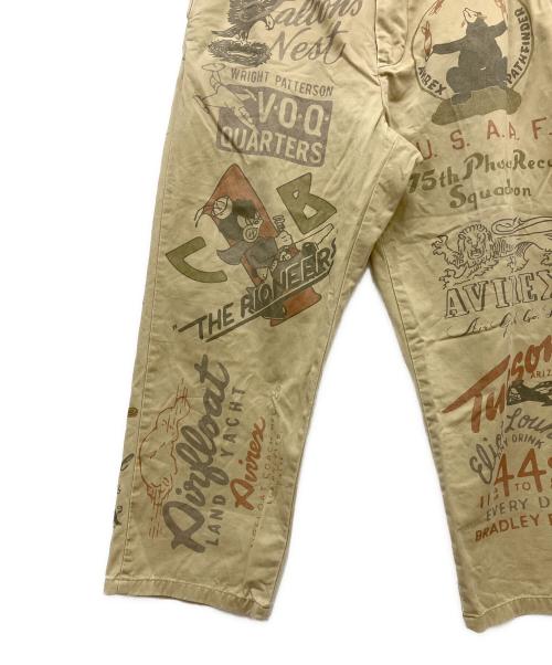 AVIREX（アヴィレックス）AVIREX (アヴィレックス) 60’s ARMY CHINO PANTS ”ARCHIVE GRAPHIC カーキ サイズ:Lの古着・服飾アイテム