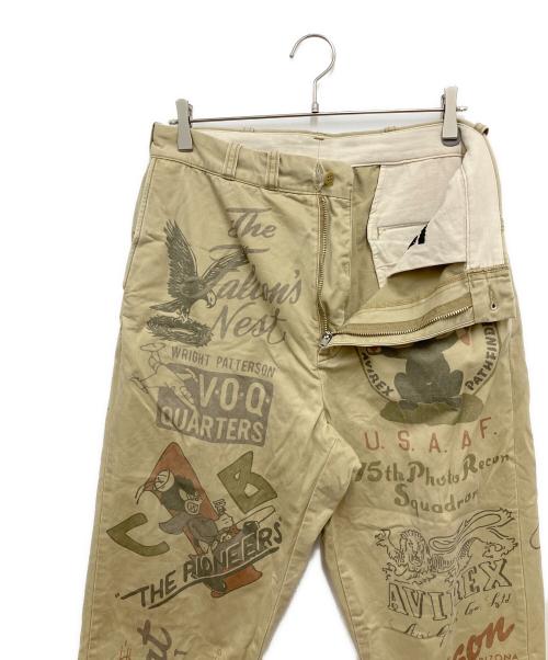 AVIREX（アヴィレックス）AVIREX (アヴィレックス) 60’s ARMY CHINO PANTS ”ARCHIVE GRAPHIC カーキ サイズ:Lの古着・服飾アイテム
