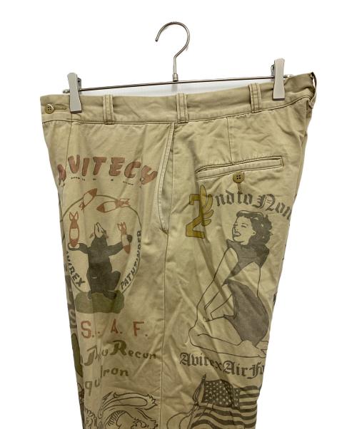 AVIREX（アヴィレックス）AVIREX (アヴィレックス) 60’s ARMY CHINO PANTS ”ARCHIVE GRAPHIC カーキ サイズ:Lの古着・服飾アイテム