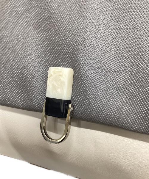 ear PAPILLONNER（イアパピヨネ）ear PAPILLONNER (イアパピヨネ) 樹脂×メタルパーツリュック グレー×ベージュの古着・服飾アイテム