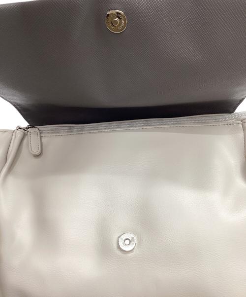 ear PAPILLONNER（イアパピヨネ）ear PAPILLONNER (イアパピヨネ) 樹脂×メタルパーツリュック グレー×ベージュの古着・服飾アイテム