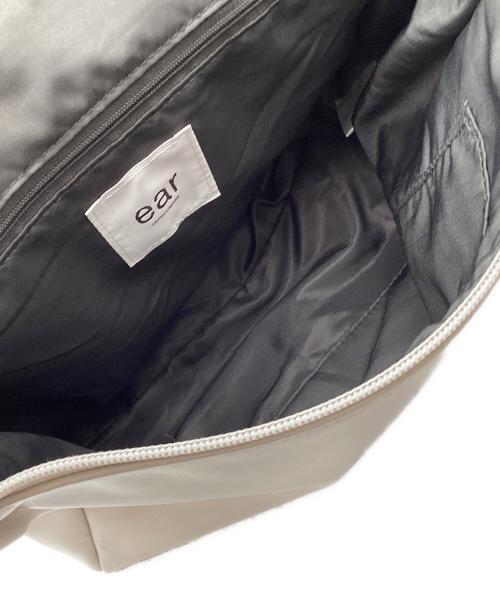 ear PAPILLONNER（イアパピヨネ）ear PAPILLONNER (イアパピヨネ) 樹脂×メタルパーツリュック グレー×ベージュの古着・服飾アイテム