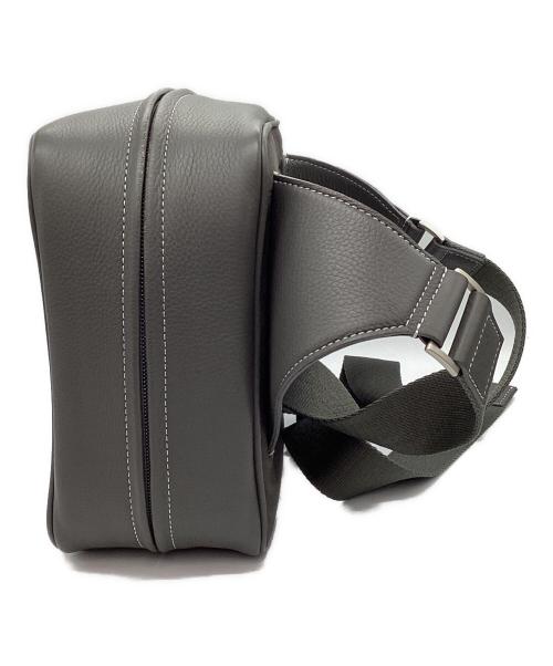 object.io（オブジェクツアイオー）object.io (オブジェクツアイオー) ウィークエンドカメラバッグ グレーの古着・服飾アイテム