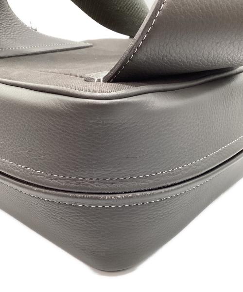 object.io（オブジェクツアイオー）object.io (オブジェクツアイオー) ウィークエンドカメラバッグ グレーの古着・服飾アイテム