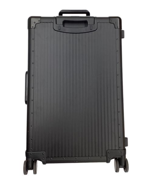 aucentic（オーセンティック）aucentic (オーセンティック) ストライプアルミニウムスーツケース ブラックの古着・服飾アイテム
