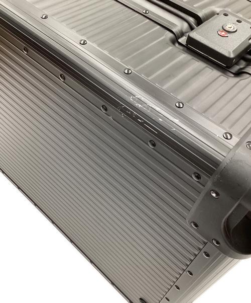 aucentic（オーセンティック）aucentic (オーセンティック) ストライプアルミニウムスーツケース ブラックの古着・服飾アイテム