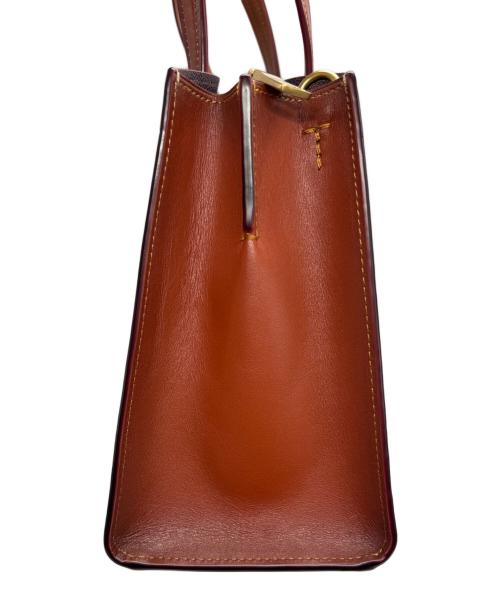 COACH（コーチ）COACH (コーチ) シグネイチャー2WAYバッグ ベージュ×ブラウンの古着・服飾アイテム