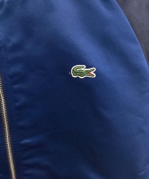 LACOSTE（ラコステ）LACOSTE (ラコステ) リバーシブルブルゾン ブルー×ネイビー サイズ:46 未使用品の古着・服飾アイテム