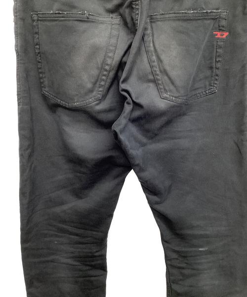 DIESEL（ディーゼル）DIESEL (ディーゼル) ダメージ加工デニムパンツ ブラック サイズ:81cm (W32)の古着・服飾アイテム