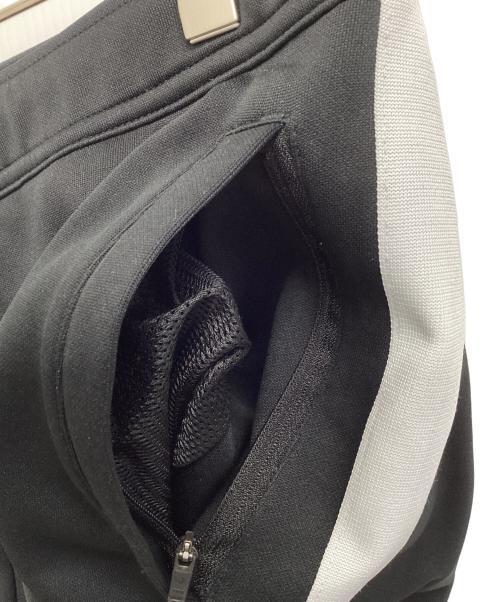 F.C.R.B.（エフシーレアルブリストル）F.C.R.B. (エフシーレアルブリストル) TRAINING TRACK PANTS ブラック×ホワイト サイズ:XLの古着・服飾アイテム