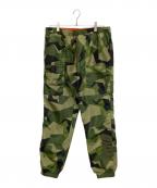 F.C.R.B.エフシーレアルブリストル）の古着「リバーシブルトラックパンツ」｜グリーン×オレンジ