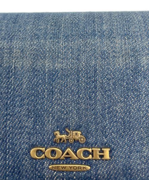 COACH（コーチ）COACH (コーチ) デニムミディアムフラップウォレット インディゴの古着・服飾アイテム