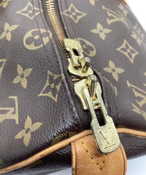LOUIS VUITTON（ルイ ヴィトン）LOUIS VUITTON (ルイ ヴィトン) トラベルバッグ ブラウンの古着・服飾アイテム