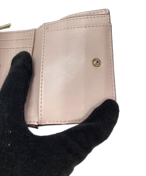 MICHAEL KORS（マイケルコース）MICHAEL KORS (マイケルコース) 3つ折り財布 ピンクの古着・服飾アイテム