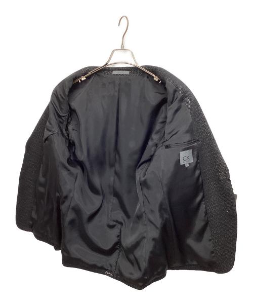 ck Calvin Klein（シーケーカルバンクライン）ck Calvin Klein (シーケーカルバンクライン) テーラードジャケット ブラック サイズ:XL 未使用品の古着・服飾アイテム