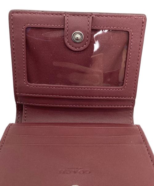 COACH（コーチ）COACH (コーチ) 2つ折り財布 ピンクの古着・服飾アイテム