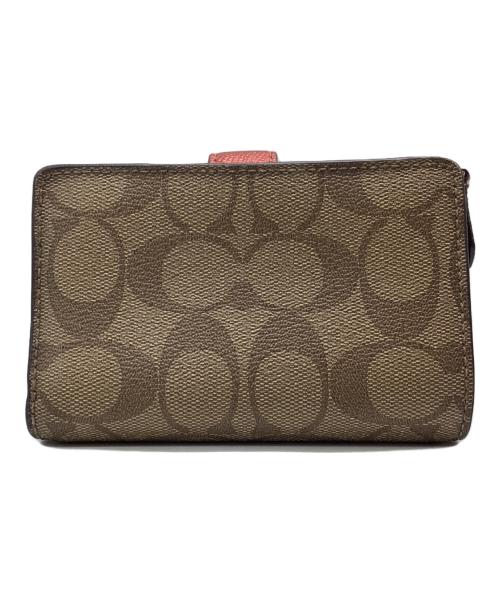 COACH（コーチ）COACH (コーチ) 2つ折り財布 シグネチャー ブラウン×ピンクの古着・服飾アイテム