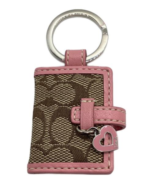 COACH（コーチ）COACH (コーチ) ブック型キーリング 	シグネチャー ピンク×ブラウンの古着・服飾アイテム