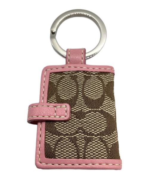 COACH（コーチ）COACH (コーチ) ブック型キーリング 	シグネチャー ピンク×ブラウンの古着・服飾アイテム