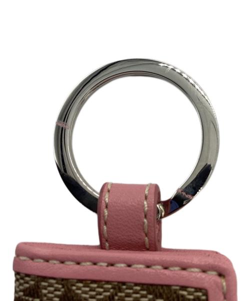 COACH（コーチ）COACH (コーチ) ブック型キーリング 	シグネチャー ピンク×ブラウンの古着・服飾アイテム