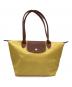 LONGCHAMP（ロンシャン）の古着「折りたたみバッグ ル プリアージュ」｜イエロー
