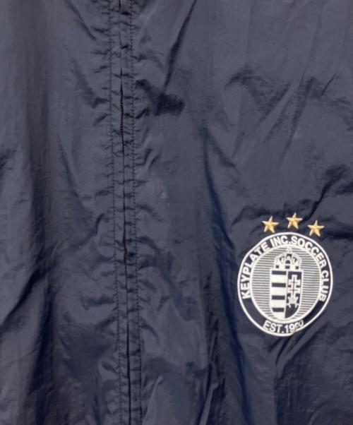 UMBRO（アンブロ）UMBRO (アンブロ) KEYPLATE トラックブルゾン ネイビー サイズ:L　の古着・服飾アイテム