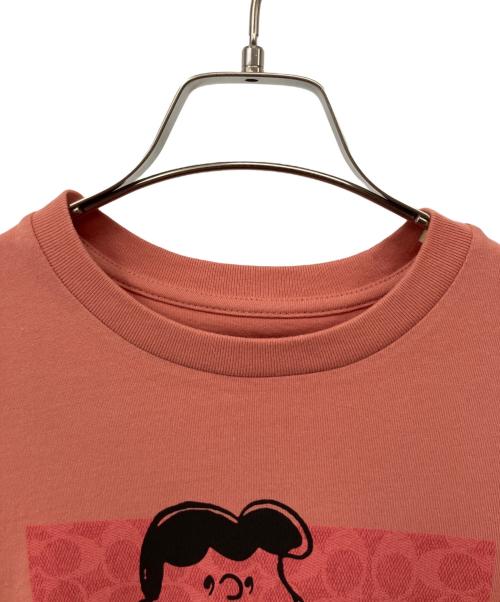 COACH（コーチ）COACH (コーチ) PEANUTS (ピーナッツ) 半袖Tシャツ ピンク サイズ:XSの古着・服飾アイテム