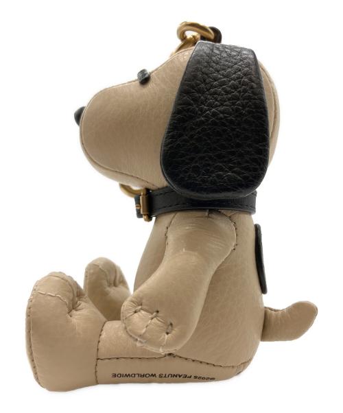 COACH（コーチ）COACH (コーチ) PEANUTS (ピーナッツ) スヌーピー バッグ チャーム ベージュ×ブラックの古着・服飾アイテム
