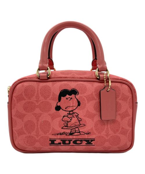 COACH（コーチ）COACH (コーチ) PEANUTS (ピーナッツ) クロスボディーバッグ ピンクの古着・服飾アイテム