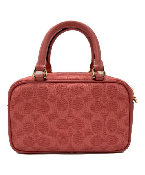 COACH（コーチ）COACH (コーチ) PEANUTS (ピーナッツ) クロスボディーバッグ ピンクの古着・服飾アイテム