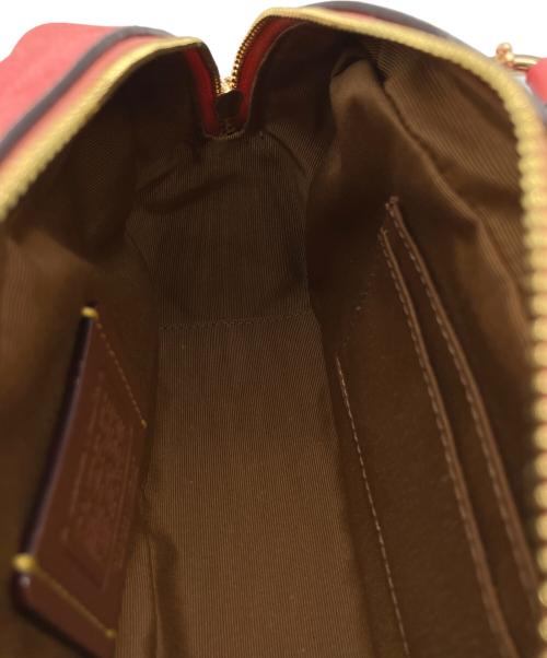 COACH（コーチ）COACH (コーチ) PEANUTS (ピーナッツ) クロスボディーバッグ ピンクの古着・服飾アイテム