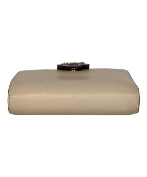 COACH（コーチ）COACH (コーチ) 2つ折り財布 ベージュの古着・服飾アイテム