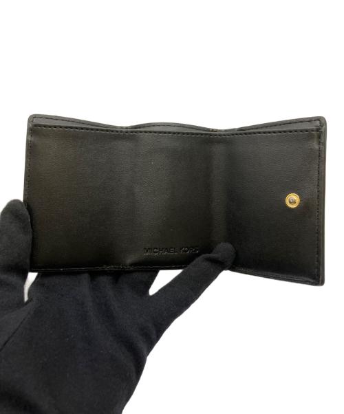 MICHAEL KORS（マイケルコース）MICHAEL KORS (マイケルコース) 2つ折り財布 ブラック×ブラウンの古着・服飾アイテム