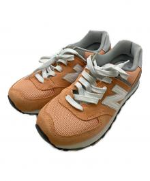 NEW BALANCE（ニューバランス）の古着「ローカットスニーカー」｜オレンジ