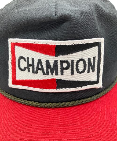 CHAMPION SPARK PLUG（チャンピオンスパークプラグ）CHAMPION SPARK PLUG (チャンピオンスパークプラグ) トラッカーキャップ ブラック×レッドの古着・服飾アイテム