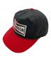 CHAMPION SPARK PLUG（チャンピオンスパークプラグ）の古着「トラッカーキャップ」｜ブラック×レッド